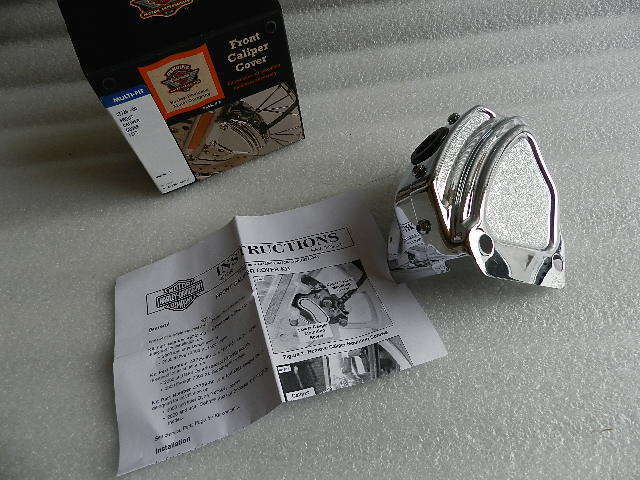 NOS OEM NEW HARLEY SPORTSTER DYNA LEFT BRAKE CALIPER COVER 43726-00