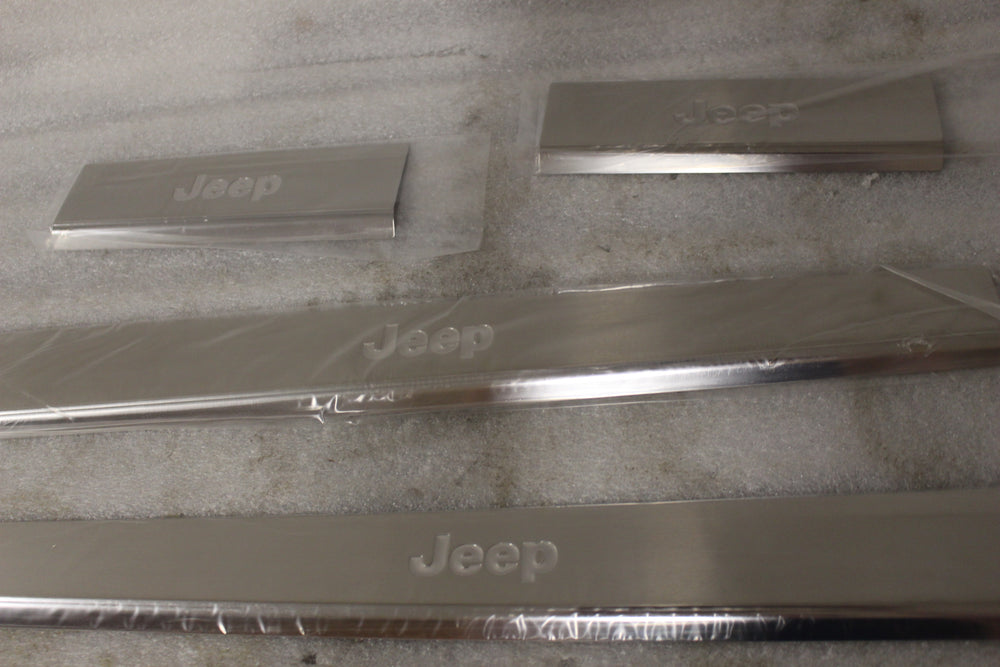 NEW JEEP GRAND CHEROKEE DOOR SILLS. 57010586AA