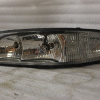 NOS NEW OEM 1997 BUICK LESABRE PASSENGER HEADLIGHT ASSEMBLY. 16524331