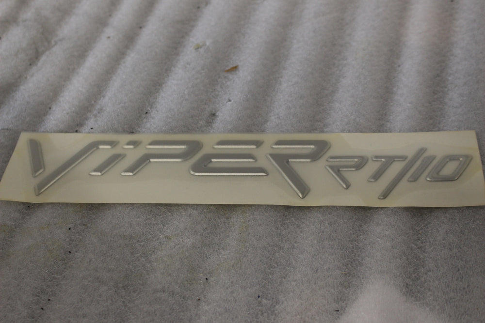 NEW NOS OEM DOGE VIPER 1998-2002 HOOD EMBLEM NAMEPLATE 4848944AA