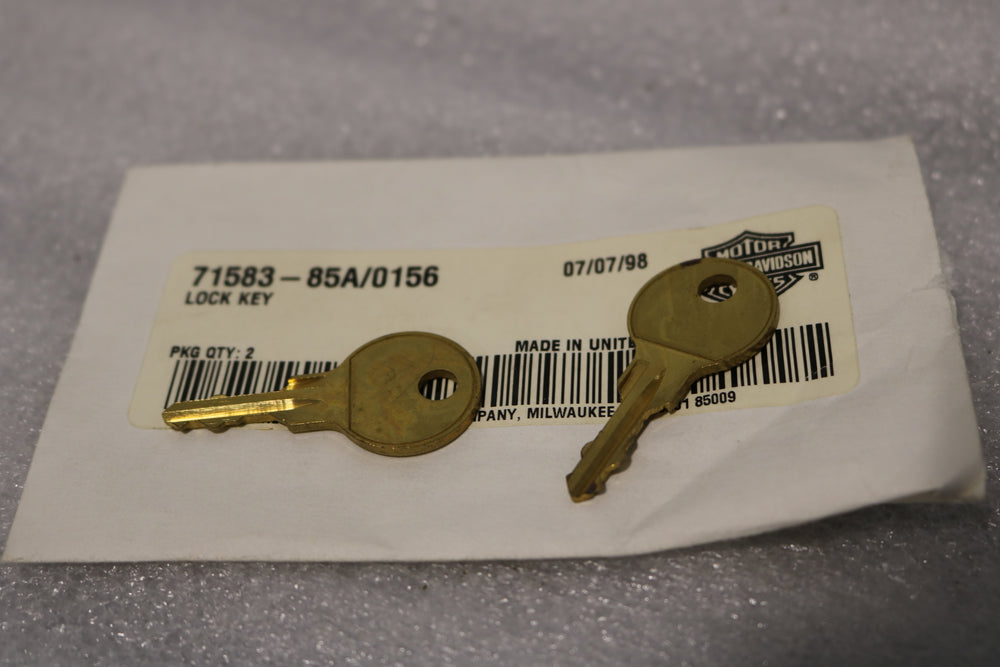 NEW OEM HARLEY SET OF KEYS 71583-85  0156