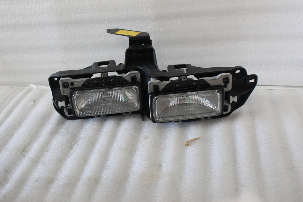 NOS NEW OEM 1992-1993 GEO STORM HEADLAMP 97025338